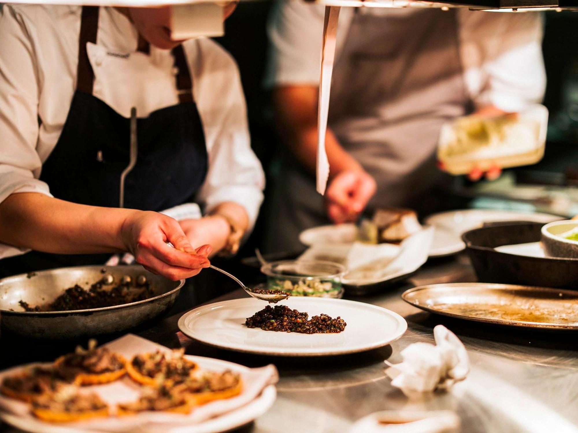 The Playford Adelaide - Mgallery Zewnętrze zdjęcie A chef plating a dish